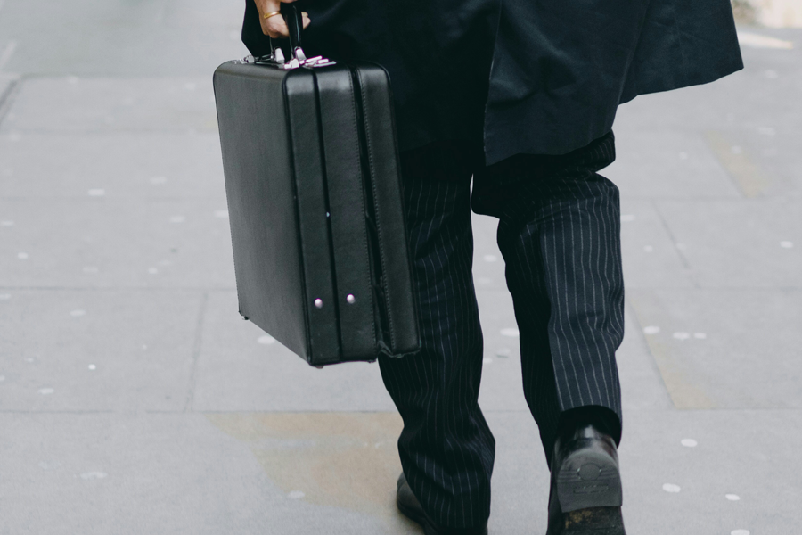 An executive carrying a briefcase.